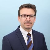 Dr. Kenred Stadler